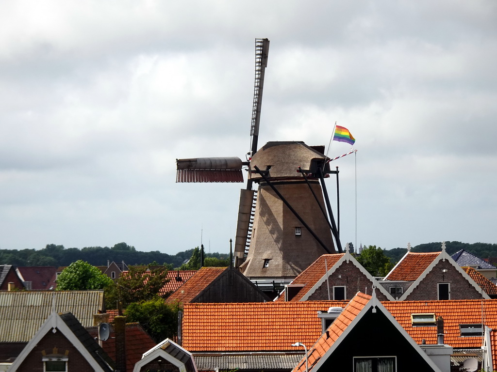 The Traanroeier windmill at Oudeschild, viewed from the dike at the Bolwerk street