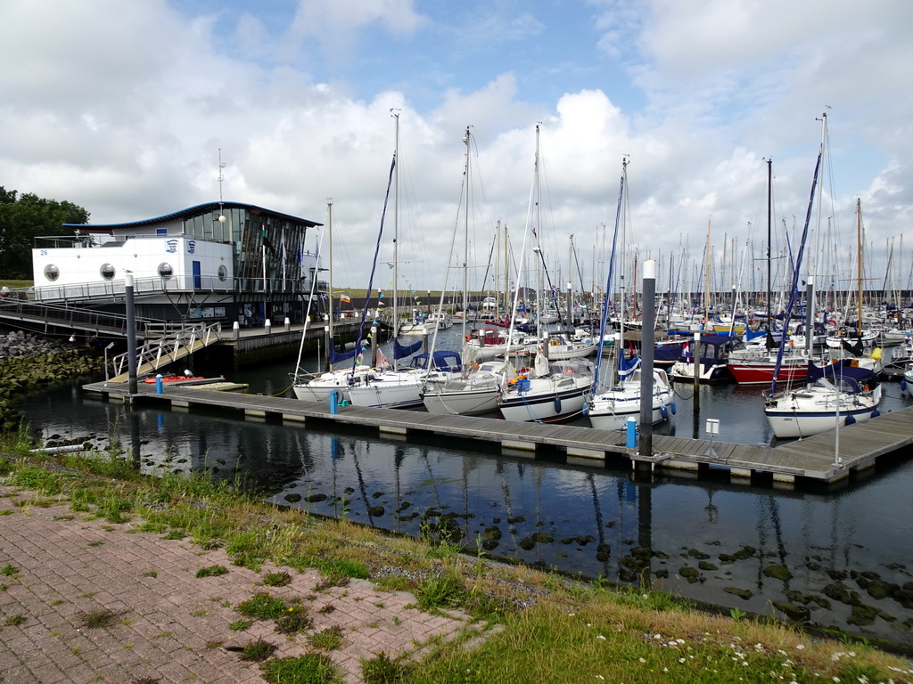 The Stichting Waddenhaven Texel building and boats in the Waddenhaven harbour at Oudeschild