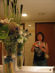 Miaomiao and a vase with plants at the Dorint Novotel hotel