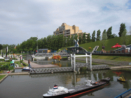 Scale models of a harbour and bridges at the Madurodam miniature park, viewed from the entrance