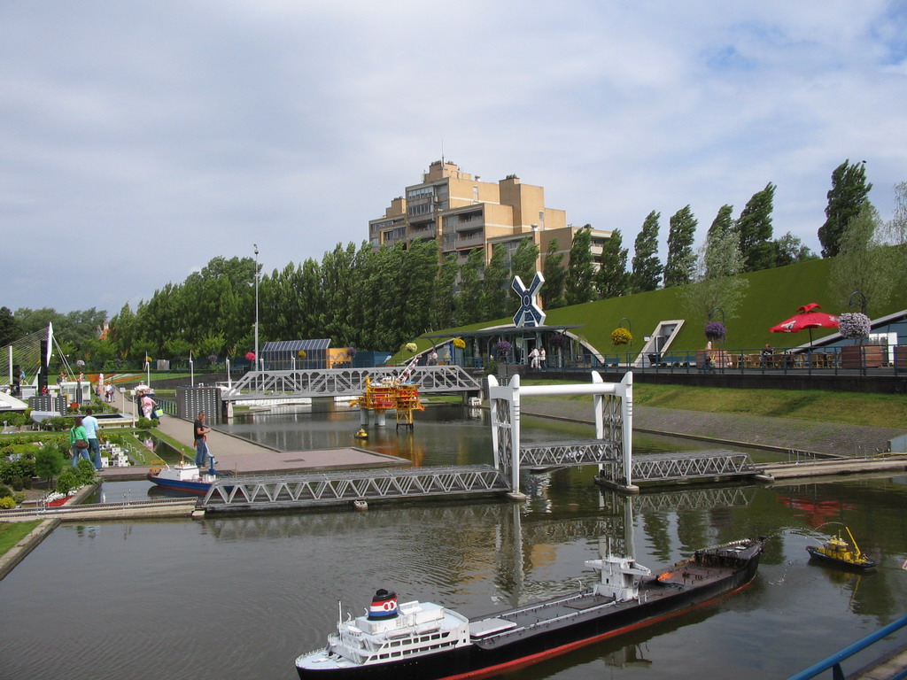 Scale models of a harbour and bridges at the Madurodam miniature park, viewed from the entrance