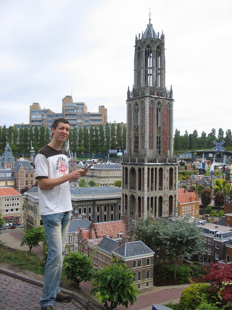 Tim with a scale model of the Dom Tower of Utrecht at the Madurodam miniature park