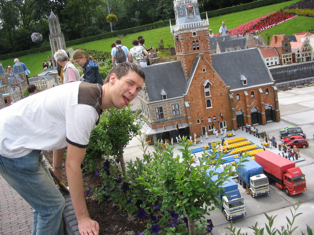 Tim with a scale model of the Waaggebouw building and Waagplein square with cheese market of Alkmaar at the Madurodam miniature park