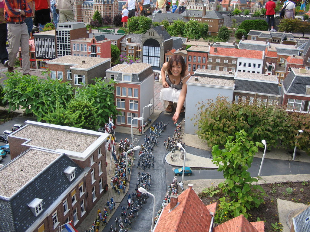 Miaomiao with a scale model of a parade at the Madurodam miniature park