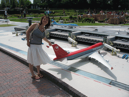 Miaomiao with a scale model of Schiphol Airport at the Madurodam miniature park