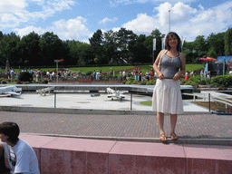 Miaomiao with a scale model of Schiphol Airport at the Madurodam miniature park