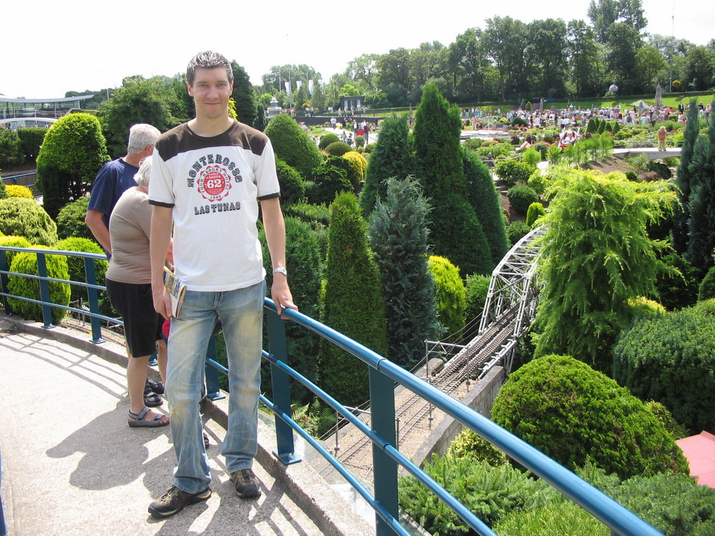 Tim with a scale model of a railway bridge at the Madurodam miniature park