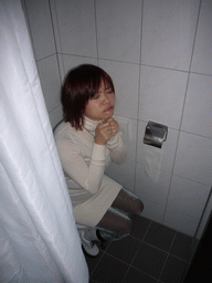 Miaomiao at the toilet in our room of the Aquarius Hotel