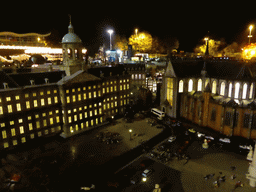 Scale model of the Dam square of Amsterdam with the Royal Palace Amsterdam and the Nieuwe Kerk church at the Madurodam miniature park, by night