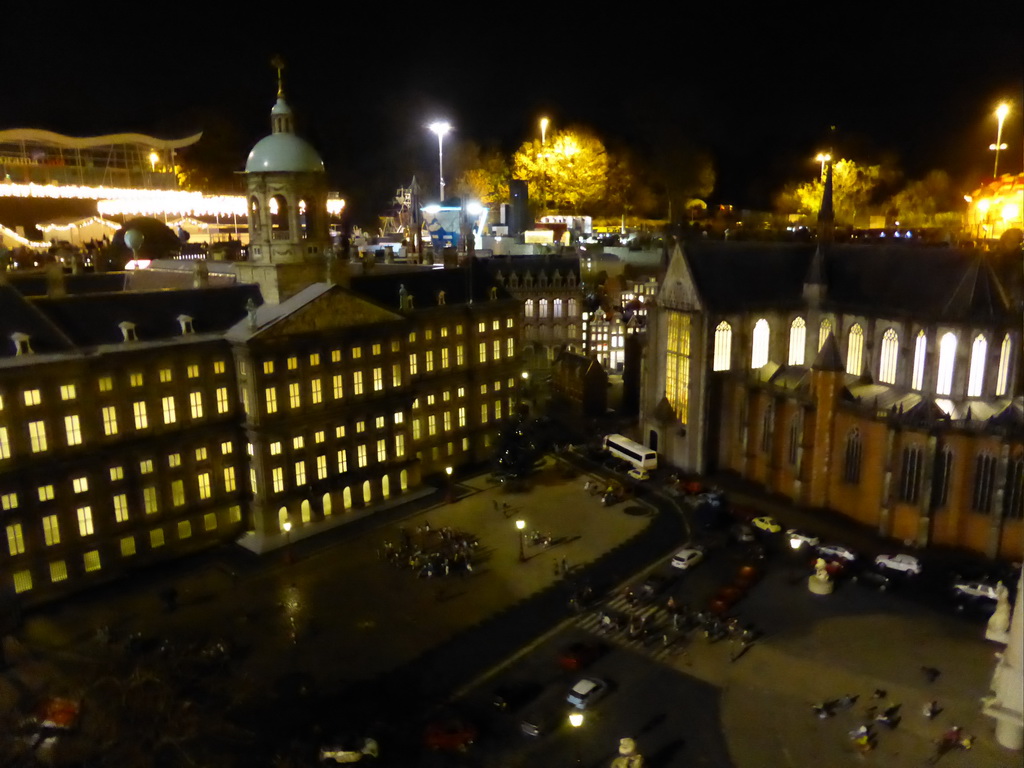 Scale model of the Dam square of Amsterdam with the Royal Palace Amsterdam and the Nieuwe Kerk church at the Madurodam miniature park, by night