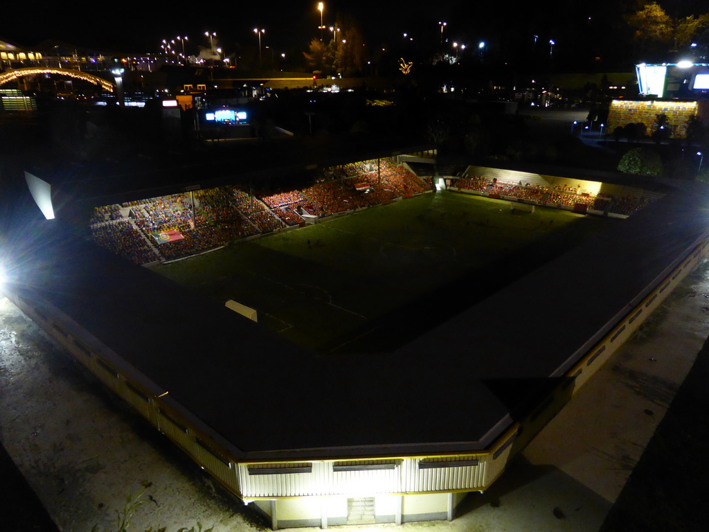 Scale model of a soccer stadium at the Madurodam miniature park, by night