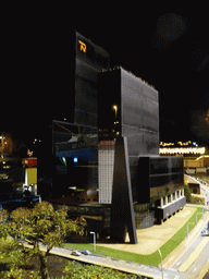 Scale model of the Gebouw Delftse Poort building of Rotterdam at the Madurodam miniature park, by night