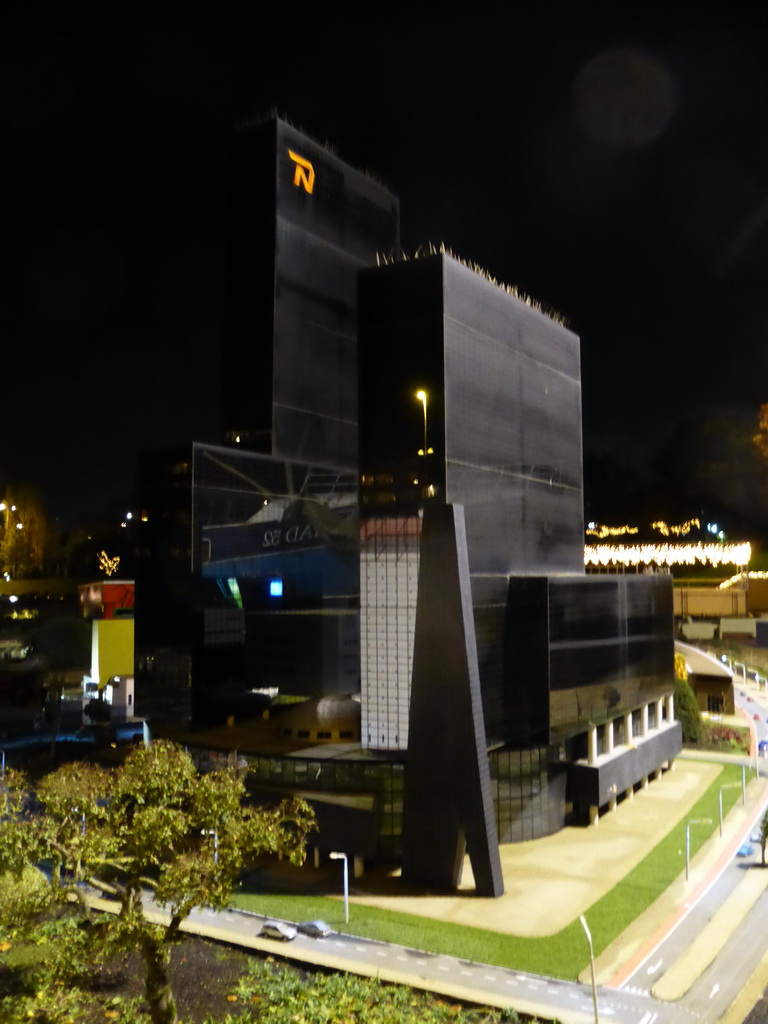 Scale model of the Gebouw Delftse Poort building of Rotterdam at the Madurodam miniature park, by night