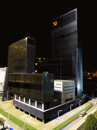 Scale model of the Gebouw Delftse Poort building of Rotterdam at the Madurodam miniature park, by night