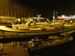 Scale model of the Rotterdam harbour and the Euromast tower at the Madurodam miniature park, by night