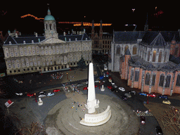 Scale model of the Dam square of Amsterdam with the Nationaal Monument, the Royal Palace Amsterdam and the Nieuwe Kerk church at the Madurodam miniature park, by night