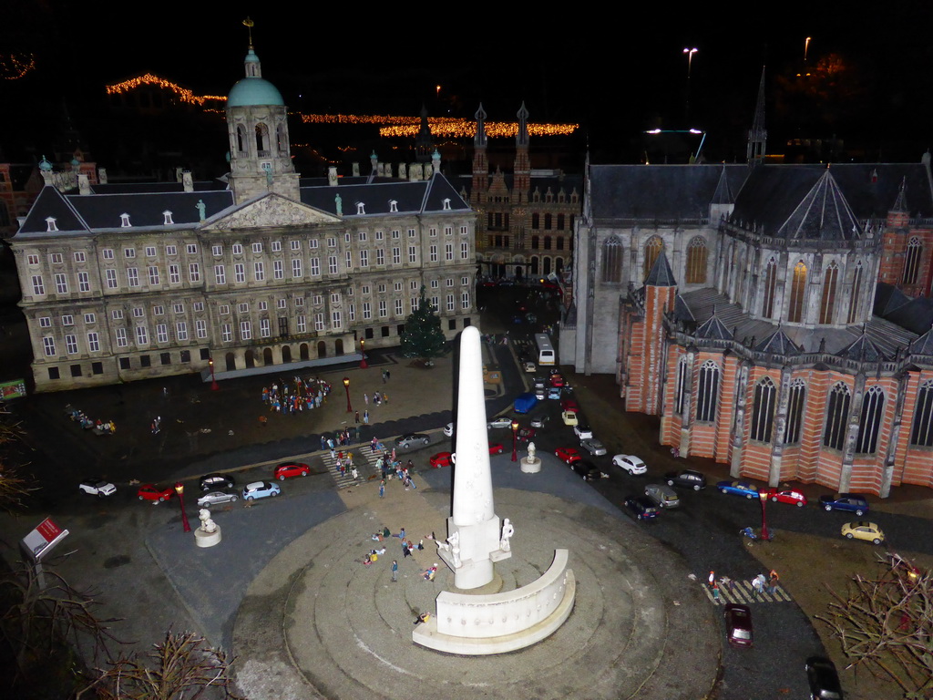 Scale model of the Dam square of Amsterdam with the Nationaal Monument, the Royal Palace Amsterdam and the Nieuwe Kerk church at the Madurodam miniature park, by night