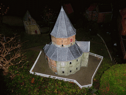 Scale model of the St. Nicholas chapel and the Barbarossa ruin of the Valkhof park of Nijmegen at the Madurodam miniature park, by night
