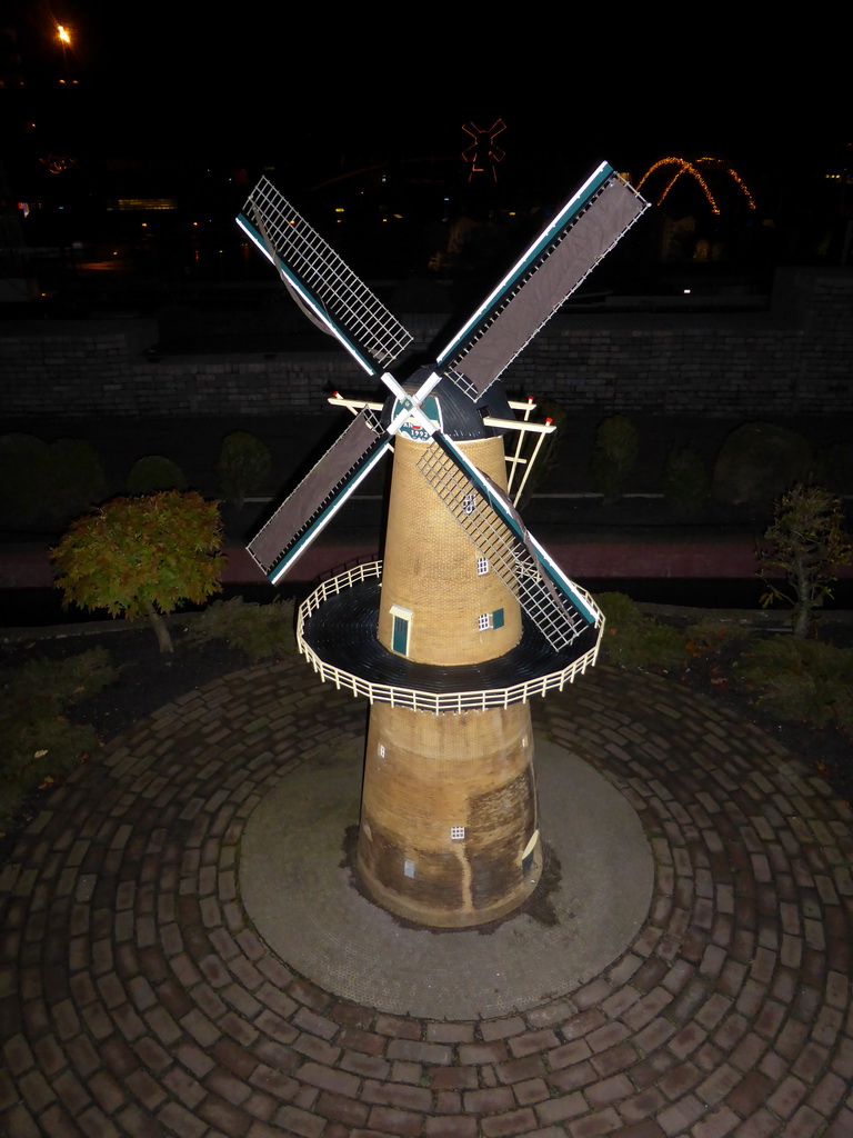 Scale model of the windmill `De Nieuwe Palmboom` of Schiedam at the Madurodam miniature park, by night