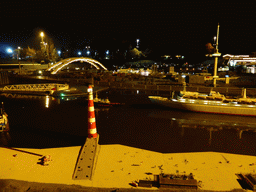 Scale model of the lighttower of Ameland and the Rotterdam harbour with the Van Brienenoordbrug bridge and the Euromast tower at the Madurodam miniature park, by night