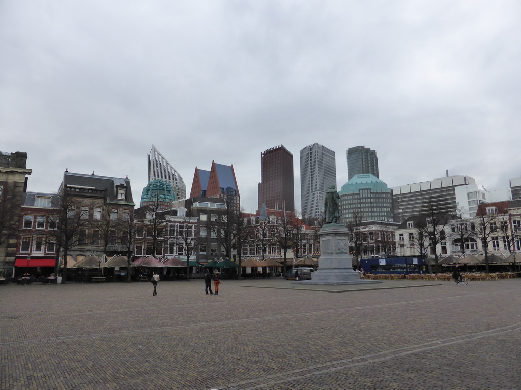 The Plein square with the statue of prince Willem I and the skyscrapers in the city center