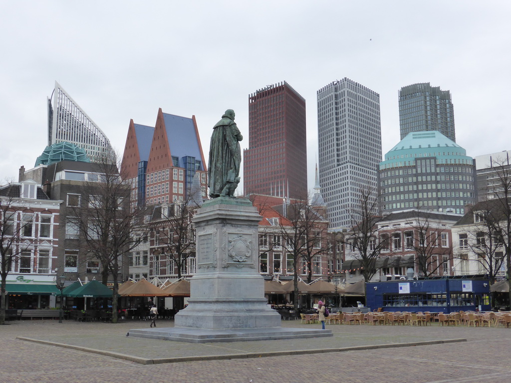 The Plein square with the statue of prince Willem I and the skyscrapers in the city center