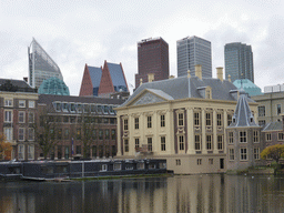 The Hofvijver pond, the Mauritshuis museum, the Torentje tower and the tall buildings in the city center
