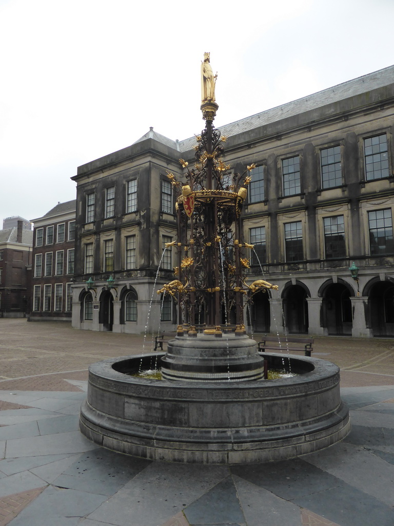 Fountain and the Tweede Kamer building at the Binnenhof square