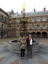 Miaomiao`s parents with the fountain at the Binnenhof square