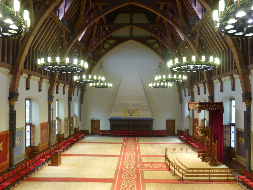 Interior of the Ridderzaal building with the constitution wall, the thrones and chandeleers