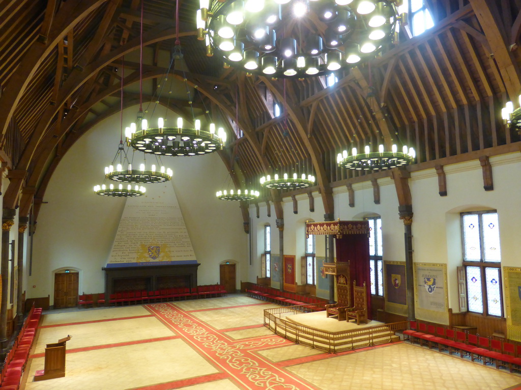 Interior of the Ridderzaal building with the constitution wall, the thrones and chandeleers