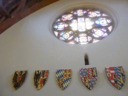 Stained glass windows and coat of arms in the Ridderzaal building