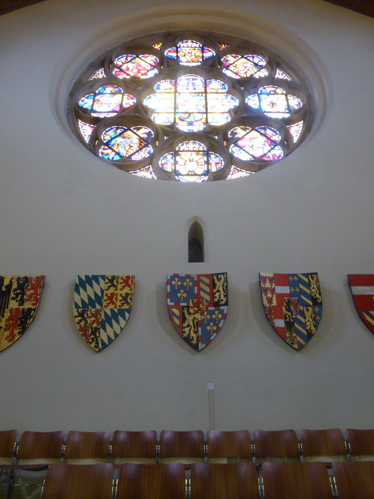 Stained glass windows and coat of arms in the Ridderzaal building