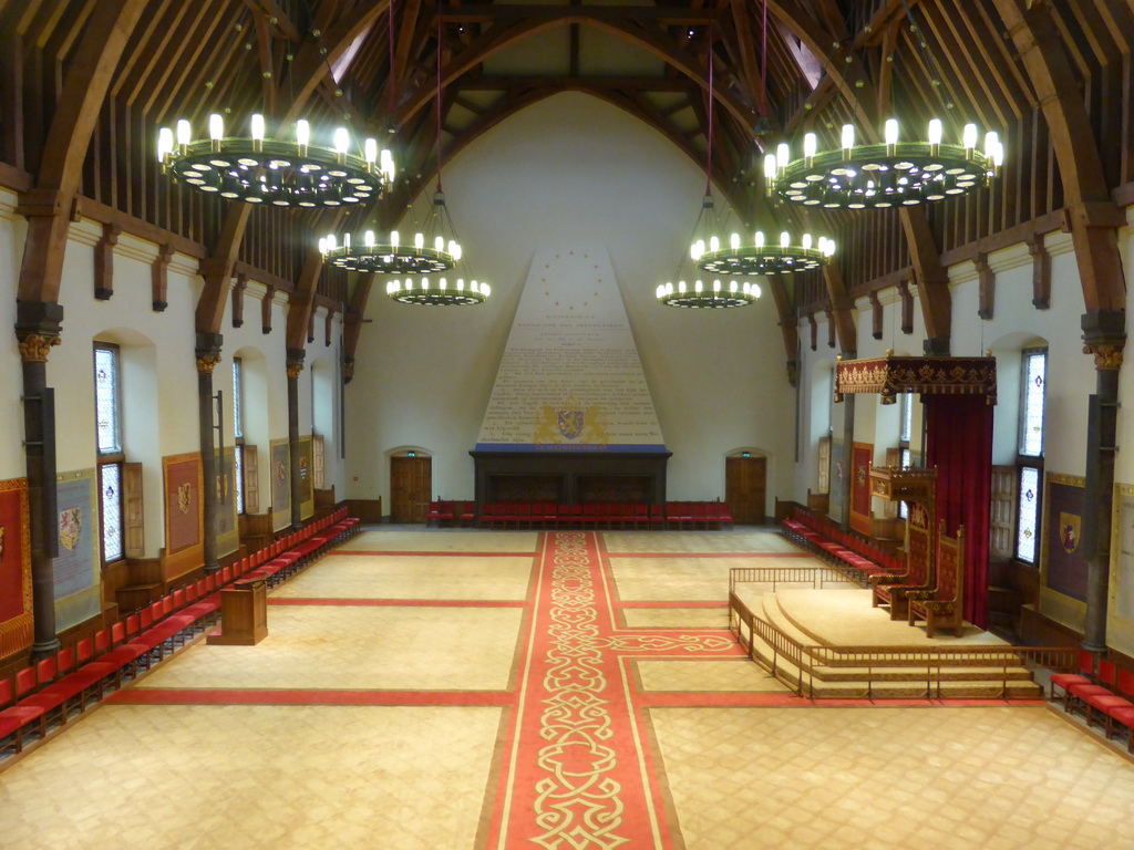 Interior of the Ridderzaal building with the constitution wall, the thrones and chandeleers