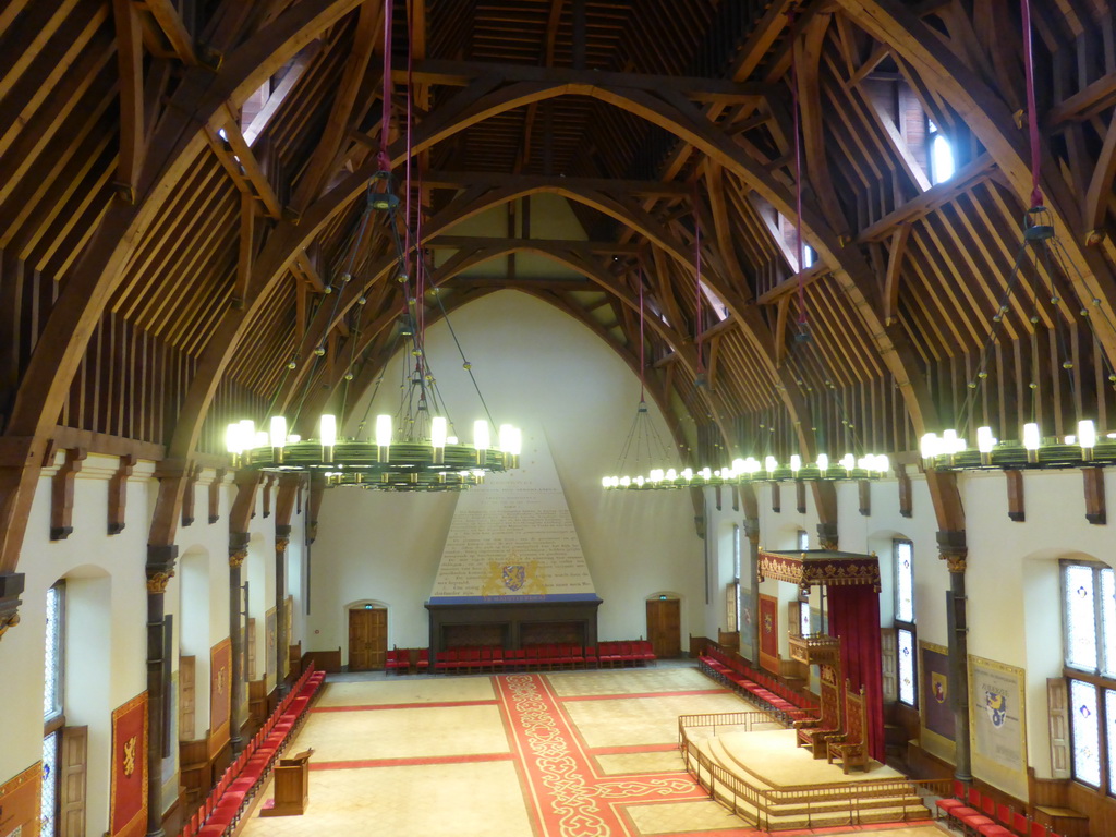 Interior of the Ridderzaal building with the constitution wall, the thrones and chandeleers