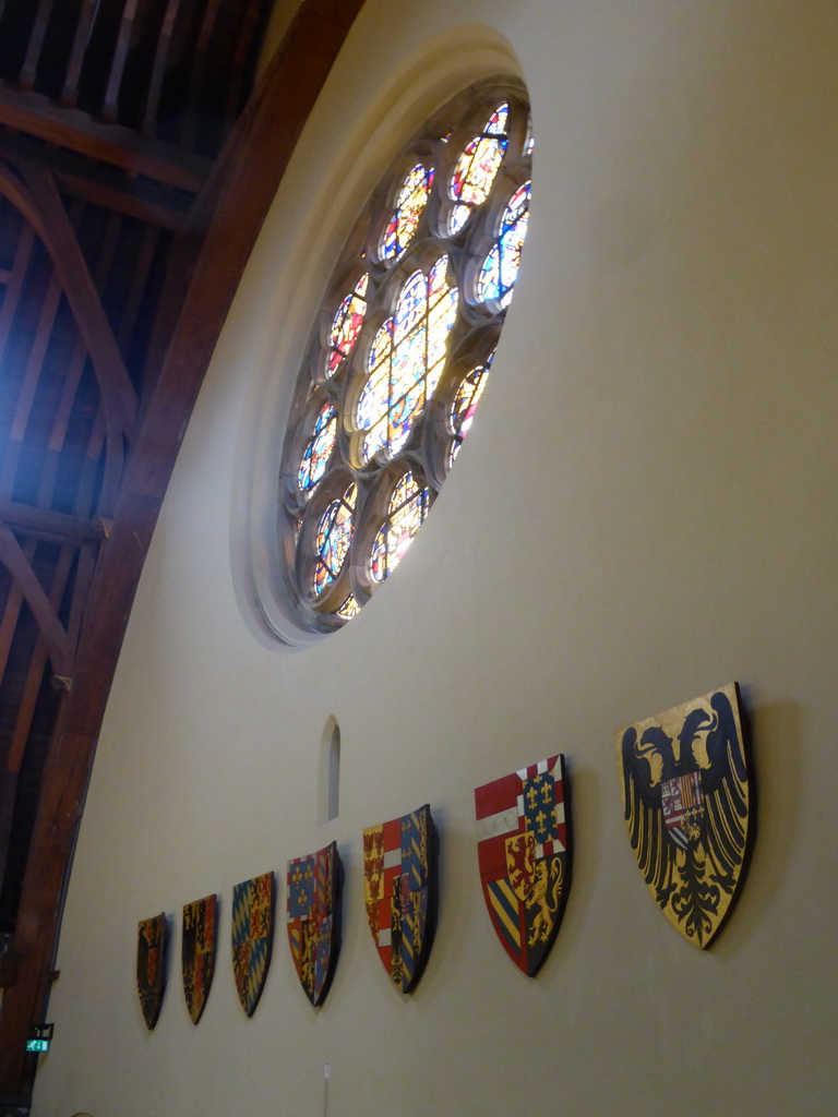 Stained glass windows and coat of arms in the Ridderzaal building