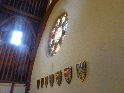 Stained glass windows and coat of arms in the Ridderzaal building