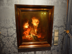 Painting `Old Woman and Boy with Candles` by Peter Paul Rubens, with explanation, at Room 3 at the First Floor of the Mauritshuis museum