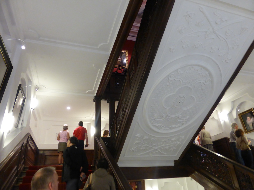 Miaomiao`s parents on the staircase from the First to the Second Floor at the Mauritshuis museum