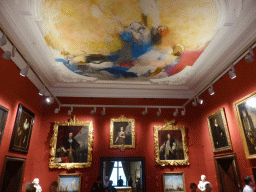 Room 16 at the Second Floor of the Mauritshuis museum, with on the ceiling the painting  `Icarus Atlanticus: Allegory of Human Vanity` by Ger Lataster