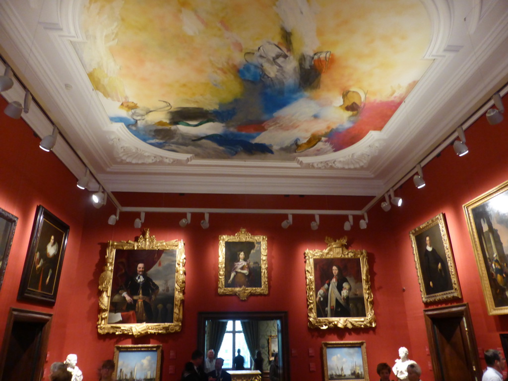 Room 16 at the Second Floor of the Mauritshuis museum, with on the ceiling the painting  `Icarus Atlanticus: Allegory of Human Vanity` by Ger Lataster