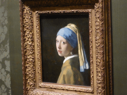 Painting `Girl with a Pearl Earring` by Johannes Vermeer, at Room 15 at the Second Floor of the Mauritshuis museum