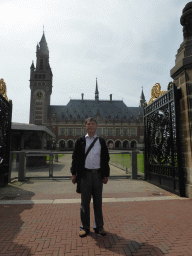 Miaomiao`s father at the front entrance to the Peace Palace at the Carnegieplein square
