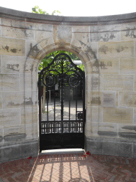 Gate to the left front entrance to the Peace Palace at the Carnegieplein square