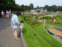 Miaomiao and Max at the south road of the Madurodam miniature park, with a view on the west side of the park