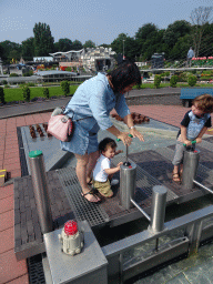Miaomiao and Max at the `Oosterscheldekering` attraction at the Madurodam miniature park