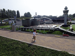 Max in front of the scale model of Schiphol Airport at the Madurodam miniature park