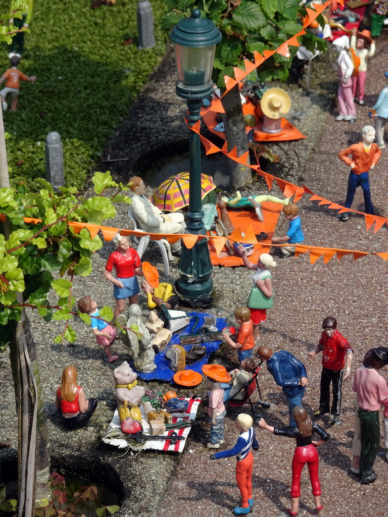 Scale model of a freemarket during King`s Day at the Madurodam miniature park