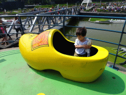 Max in a large wooden shoe at the Madurodam miniature park