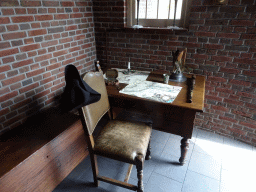 Desk with old maps in the lobby of the `Nieuw Amsterdam` attraction at the Madurodam miniature park